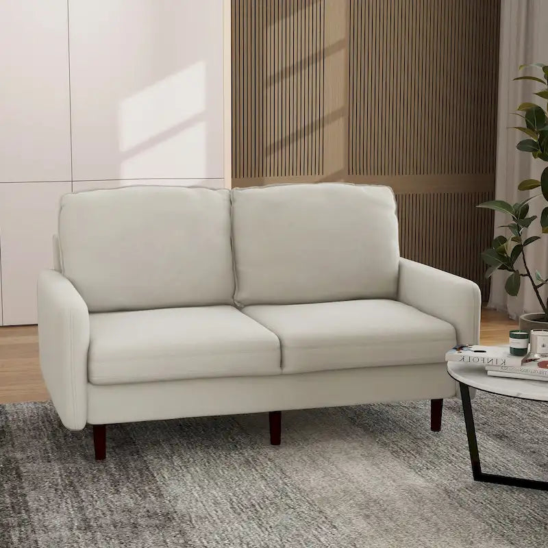 Divano moderno con gambe in legno e velluto